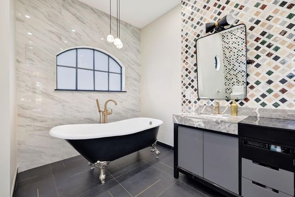 Bathroom, Dual Sink Vanities, Free Standing Baths, Interior, Marble, Marble Walls, Pendant Lights, Recessed Lighting