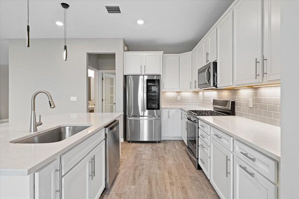 Interior, Kitchen, Pendant Lights, Recessed Lighting, Stainless Steel Appliances, Wood Texture Flooring