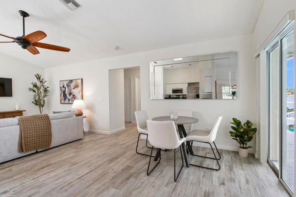 Dining room, Interior, Kitchen, Living room, Recessed Lighting, Stainless Steel Appliances, Wood Texture Flooring