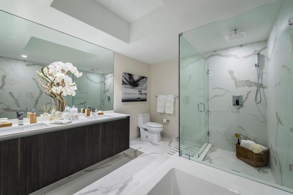 Bathroom, Dual Sink Vanities, Glass Shower, Interior, Marble, Marble Walls, Recessed Lighting