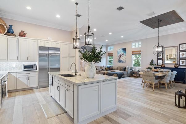 Dining room, Interior, Kitchen, Living room, Pendant Lights, Recessed Lighting, Stainless Steel Appliances, Wood Texture Flooring