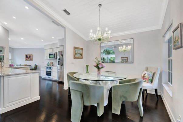 Chandelier, Dining room, Interior, Kitchen, Recessed Lighting, Stainless Steel Appliances, Wood Texture Flooring