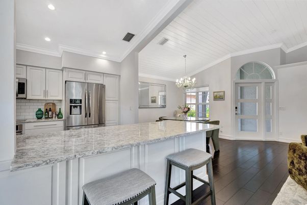 Chandelier, Interior, Kitchen, Recessed Lighting, Stainless Steel Appliances, Wood Texture Flooring