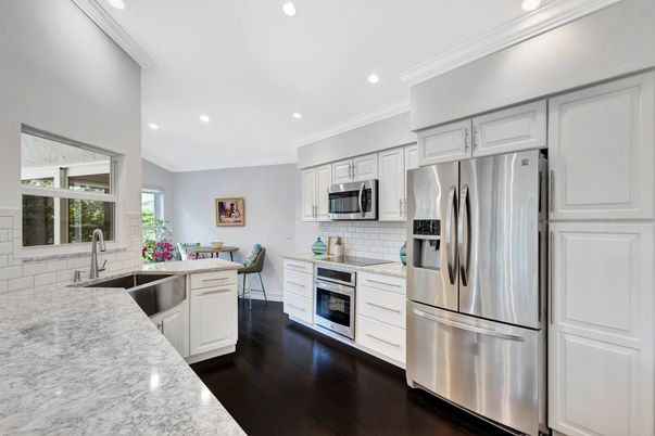 Dining room, Interior, Kitchen, Recessed Lighting, Stainless Steel Appliances, Wood Texture Flooring