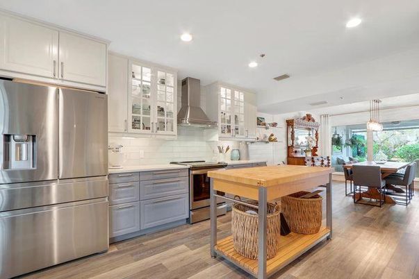 Dining room, Interior, Kitchen, Pendant Lights, Recessed Lighting, Stainless Steel Appliances, Wood Texture Flooring
