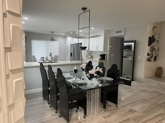 Dining room, Interior, Kitchen, Pendant Lights, Recessed Lighting, Stainless Steel Appliances, Wood Texture Flooring