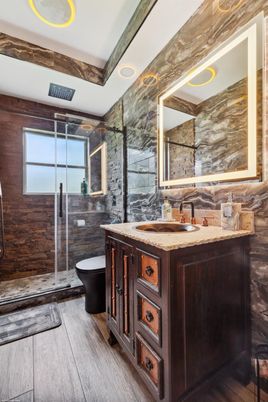Bathroom, Dual Sink Vanities, Interior, Recessed Lighting, Wood Texture Flooring, Wooden Walls