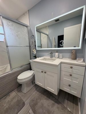 Bathroom, Dual Sink Vanities, Glass Shower, Interior, Wood Texture Flooring