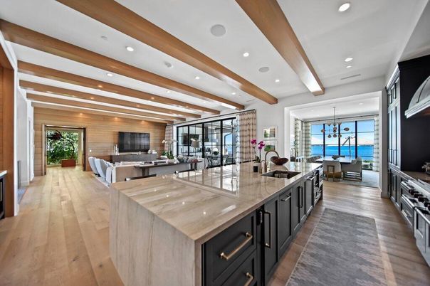 Interior, Kitchen, Living room, Pendant Lights, Recessed Lighting, Stainless Steel Appliances, Water, Wooden Beams, Wood Texture Flooring