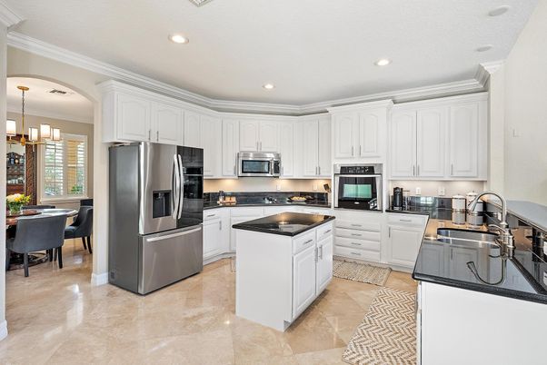 Chandelier, Dining room, Interior, Kitchen, Pendant Lights, Recessed Lighting, Stainless Steel Appliances