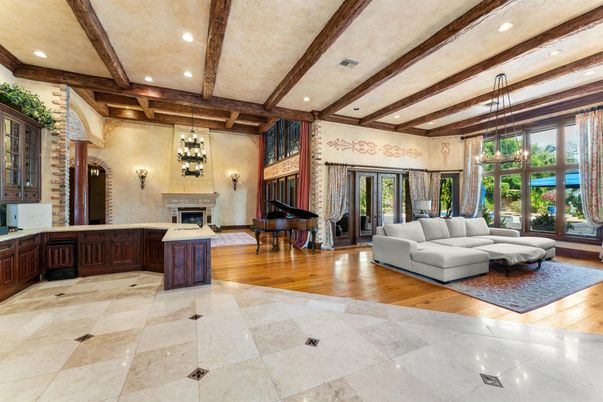Fireplace, Interior, Living room, Pendant Lights, Piano, Recessed Lighting, Wooden Beams, Wood Texture Flooring