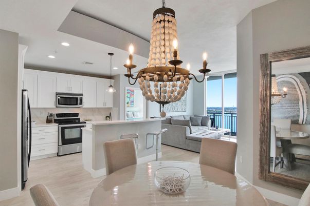 Chandelier, Dining room, Interior, Kitchen, Living room, Pendant Lights, Recessed Lighting, Stainless Steel Appliances, Wood Texture Flooring