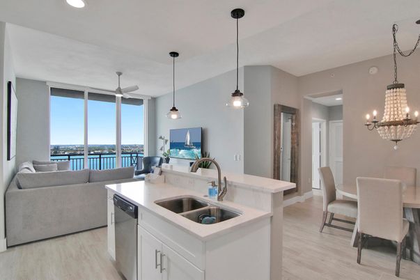 Chandelier, Dining room, Interior, Kitchen, Living room, Pendant Lights, Recessed Lighting, Water, Wood Texture Flooring