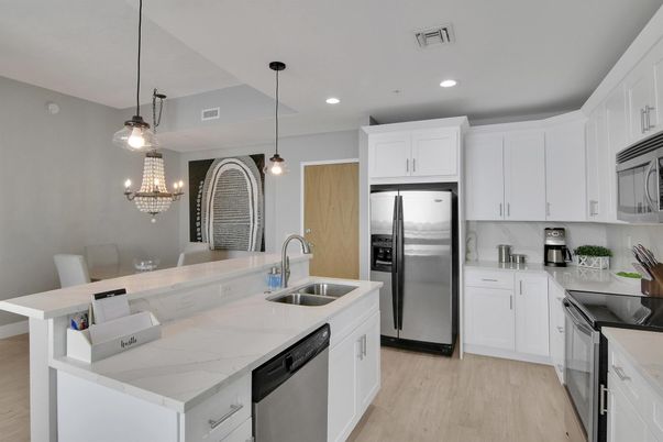 Dining room, Interior, Kitchen, Pendant Lights, Recessed Lighting, Stainless Steel Appliances, Wood Texture Flooring