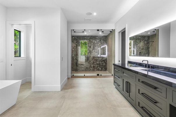 Bathroom, Dual Sink Vanities, Glass Shower, Interior, Marble Walls, Recessed Lighting