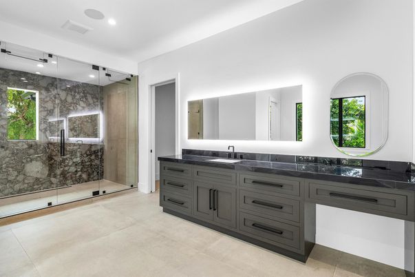 Bathroom, Dual Sink Vanities, Glass Shower, Interior, Marble Walls, Recessed Lighting