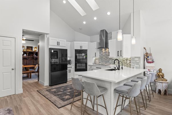 Interior, Kitchen, Pendant Lights, Recessed Lighting, Stainless Steel Appliances, Wood Texture Flooring