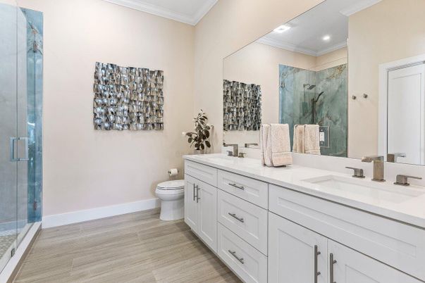 Bathroom, Dual Sink Vanities, Glass Shower, Interior, Recessed Lighting, Wood Texture Flooring