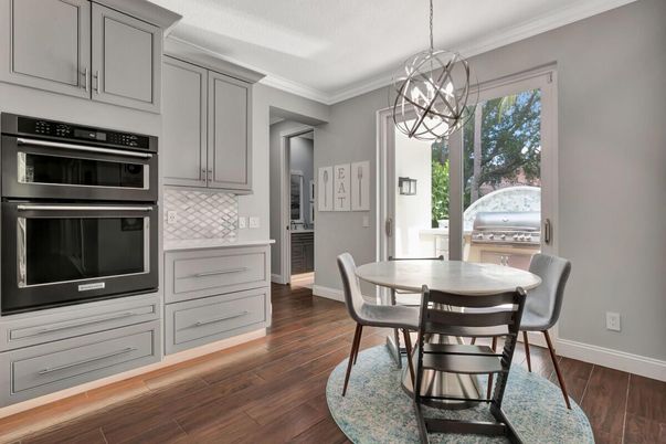 Dining room, Interior, Kitchen, Pendant Lights, Stainless Steel Appliances, Wood Texture Flooring