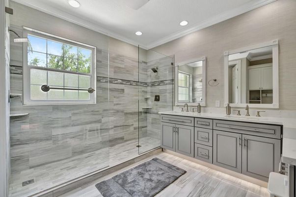 Bathroom, Dual Sink Vanities, Glass Shower, Interior, Recessed Lighting, Wood Texture Flooring