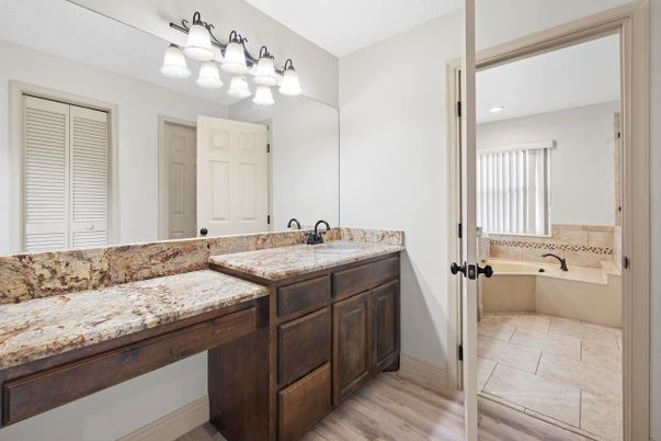 Bathroom, Dual Sink Vanities, Interior, Recessed Lighting, Wood Texture Flooring