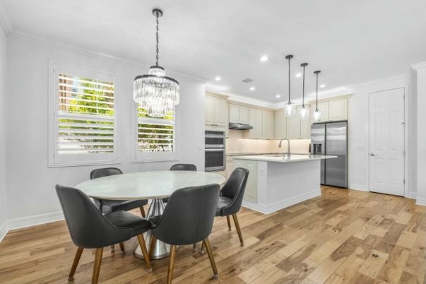 Chandelier, Dining room, Interior, Kitchen, Pendant Lights, Recessed Lighting, Stainless Steel Appliances, Wood Texture Flooring