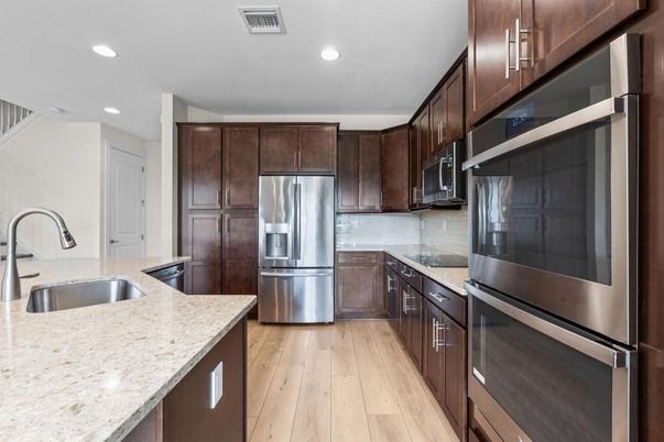 Interior, Kitchen, Recessed Lighting, Stainless Steel Appliances, Wood Texture Flooring