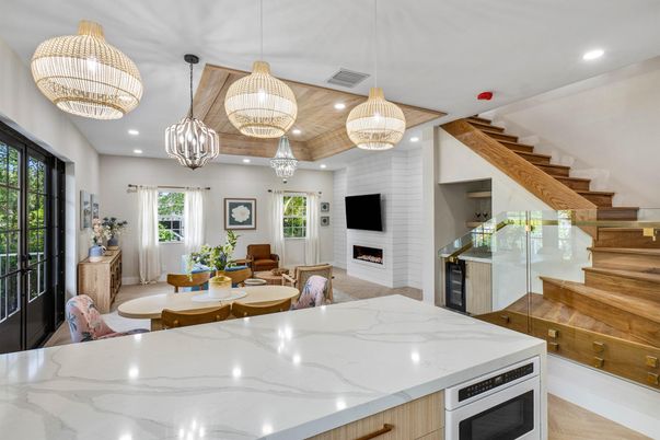 Dining room, Fireplace, Interior, Kitchen, Living room, Pendant Lights, Recessed Lighting, Wooden Ceilings, Wood Texture Flooring
