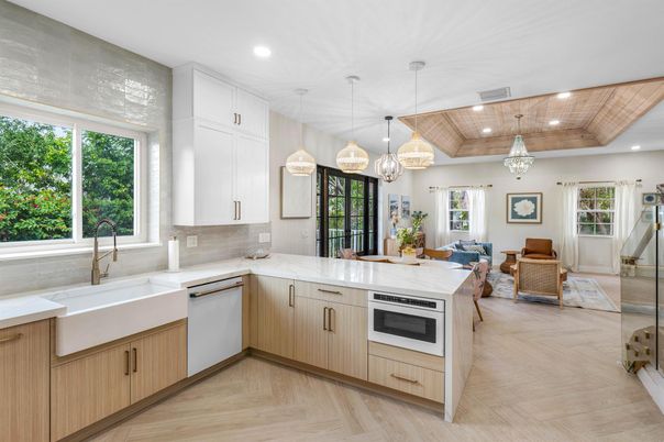 Chandelier, Interior, Kitchen, Living room, Pendant Lights, Recessed Lighting, Stainless Steel Appliances, Wooden Ceilings, Wood Texture Flooring