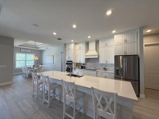 Dining room, Interior, Kitchen, Recessed Lighting, Stainless Steel Appliances, Wood Texture Flooring