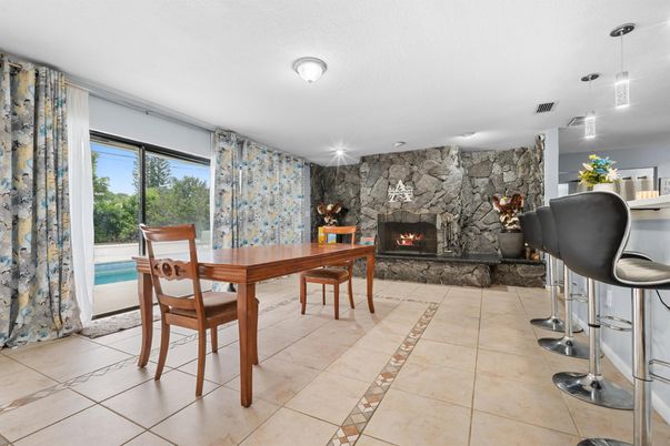 Dining room, Fireplace, Interior, Pendant Lights, Stone Walls