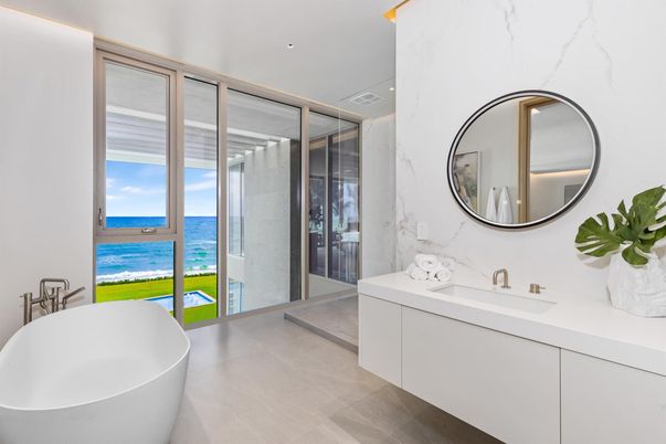 Bathroom, Dual Sink Vanities, Free Standing Baths, Glass Shower, Interior, Marble Walls, Recessed Lighting, Water