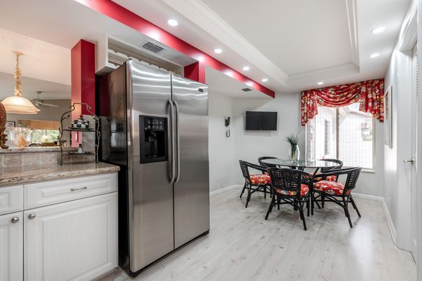Dining room, Interior, Kitchen, Pendant Lights, Recessed Lighting, Stainless Steel Appliances, Wood Texture Flooring