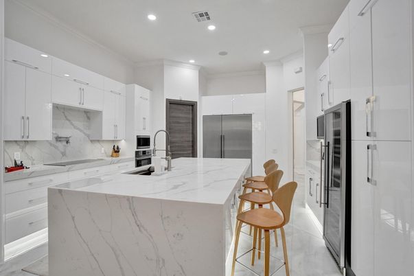 Interior, Kitchen, Marble Walls, Recessed Lighting, Stainless Steel Appliances