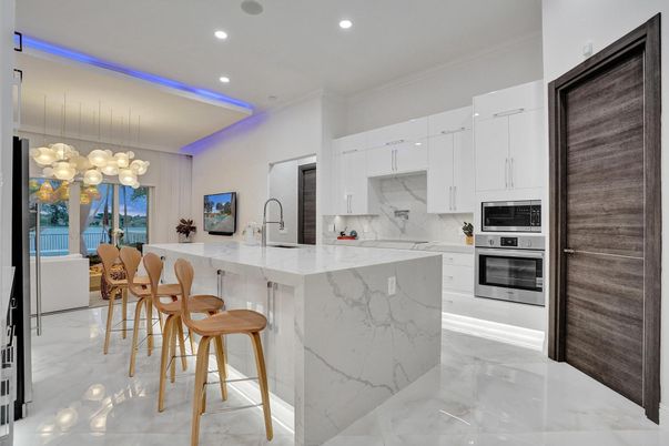 Interior, Kitchen, Marble, Marble Walls, Pendant Lights, Recessed Lighting, Stainless Steel Appliances