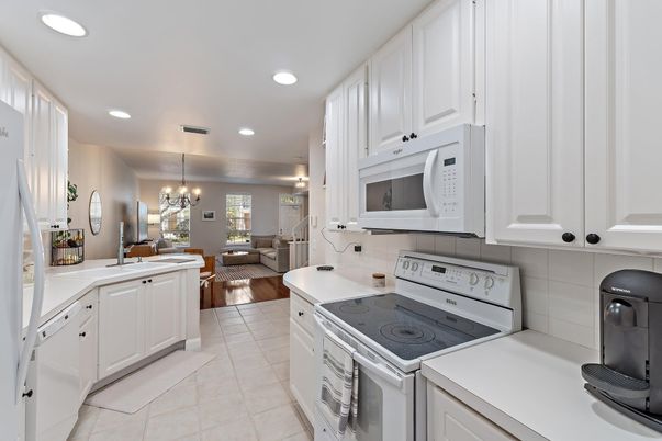 Chandelier, Dining room, Interior, Kitchen, Living room, Recessed Lighting, Wood Texture Flooring