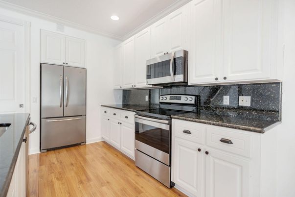 Interior, Kitchen, Recessed Lighting, Stainless Steel Appliances, Wood Texture Flooring