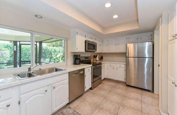 Interior, Kitchen, Recessed Lighting, Stainless Steel Appliances, Tile Countertops