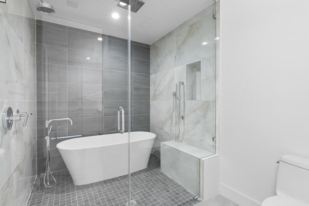 Bathroom, Free Standing Baths, Glass Shower, Interior, Marble Walls, Recessed Lighting
