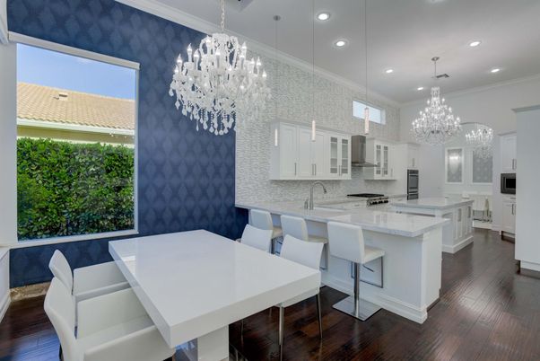 Chandelier, Dining room, Interior, Kitchen, Pendant Lights, Recessed Lighting, Stainless Steel Appliances, Wood Texture Flooring