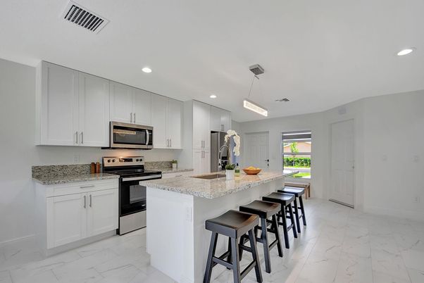 Interior, Kitchen, Marble, Pendant Lights, Recessed Lighting, Stainless Steel Appliances