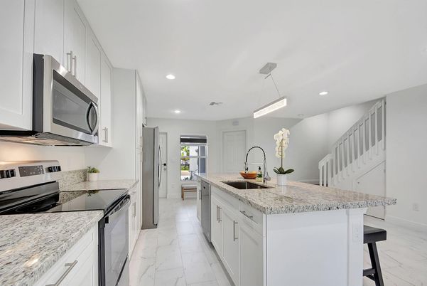Interior, Kitchen, Marble, Pendant Lights, Recessed Lighting, Stainless Steel Appliances