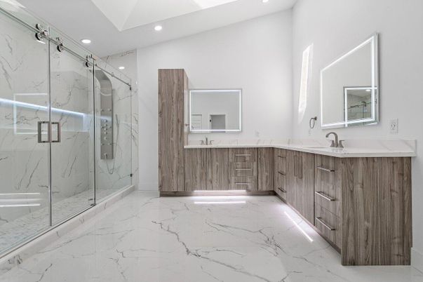 Bathroom, Dual Sink Vanities, Glass Shower, Interior, Marble, Marble Walls, Recessed Lighting