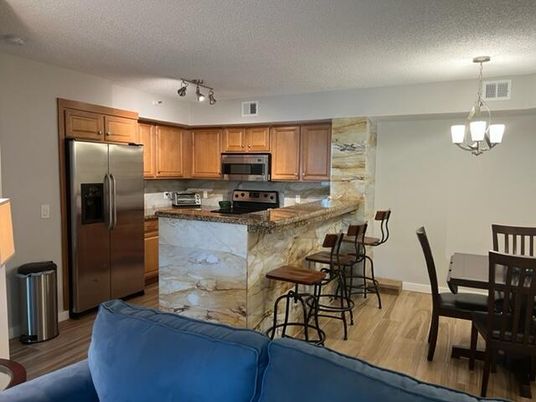 Dining room, Interior, Kitchen, Pendant Lights, Stainless Steel Appliances, Wood Texture Flooring