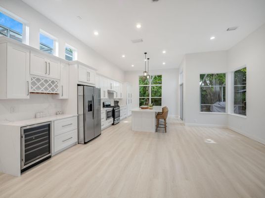 Dining room, Interior, Kitchen, Pendant Lights, Recessed Lighting, Stainless Steel Appliances, Wood Texture Flooring