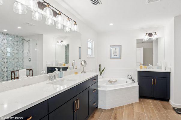 Bathroom, Dual Sink Vanities, Glass Shower, Interior, Recessed Lighting, Wood Texture Flooring