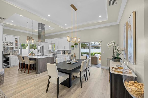 Chandelier, Dining room, Interior, Kitchen, Pendant Lights, Recessed Lighting, Stainless Steel Appliances, Wood Texture Flooring