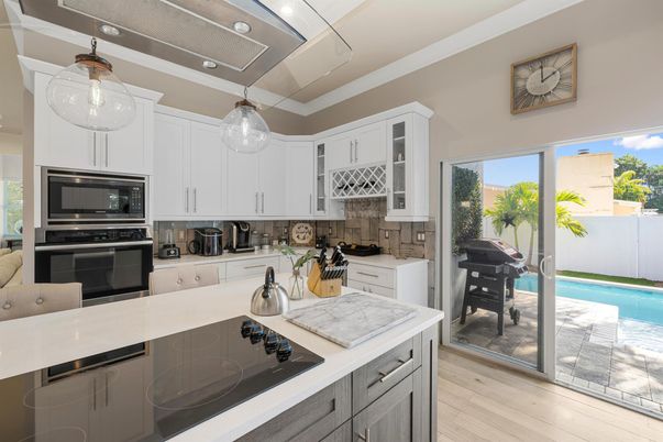 Interior, Kitchen, Pendant Lights, Stainless Steel Appliances, Wood Texture Flooring