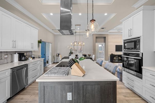 Dining room, Interior, Kitchen, Pendant Lights, Recessed Lighting, Stainless Steel Appliances, Wood Texture Flooring