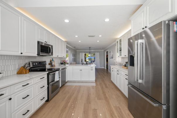 Interior, Kitchen, Pendant Lights, Recessed Lighting, Stainless Steel Appliances, Wood Texture Flooring